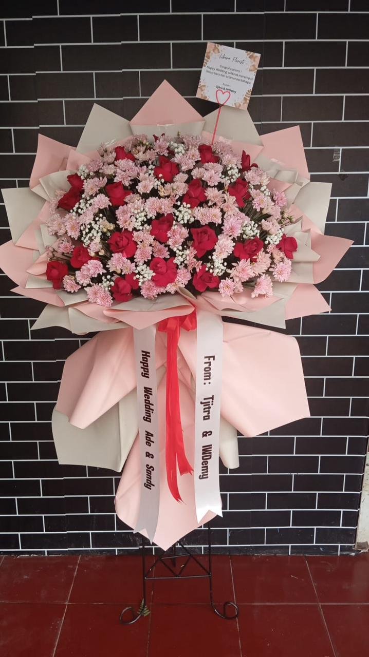 Standing flower selamat dan sukses pelantikan dari PT PLN Nusantara Power mawar pink putih anggrek bulan ungu